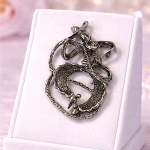 Cowboy and lasso brooch